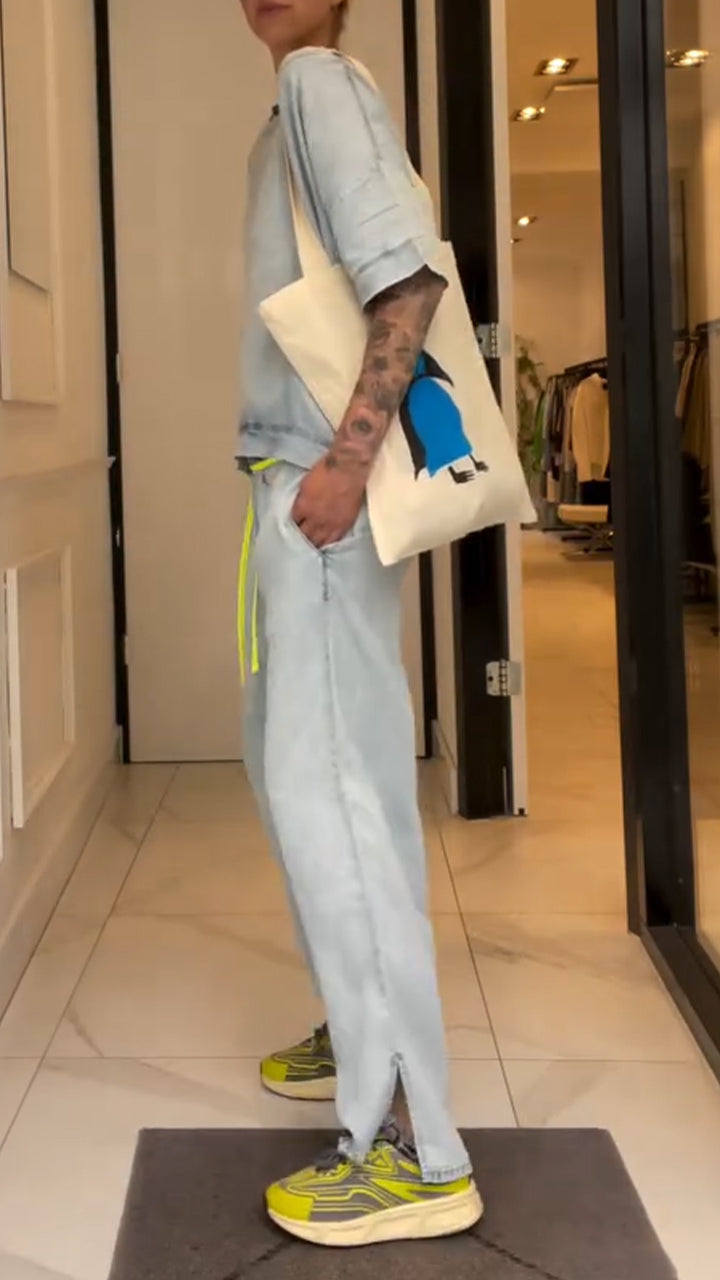 Completo da donna con colletto diagonale, tinta unita e pantaloni casual