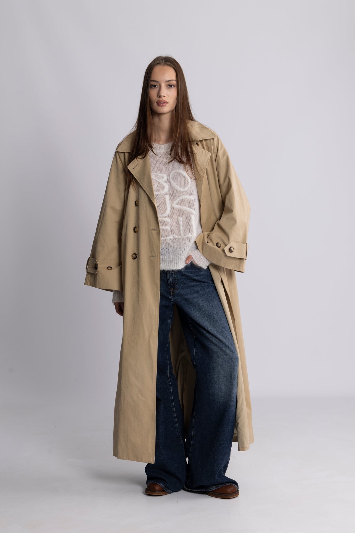 Versatile item: Women's button-down trench coat