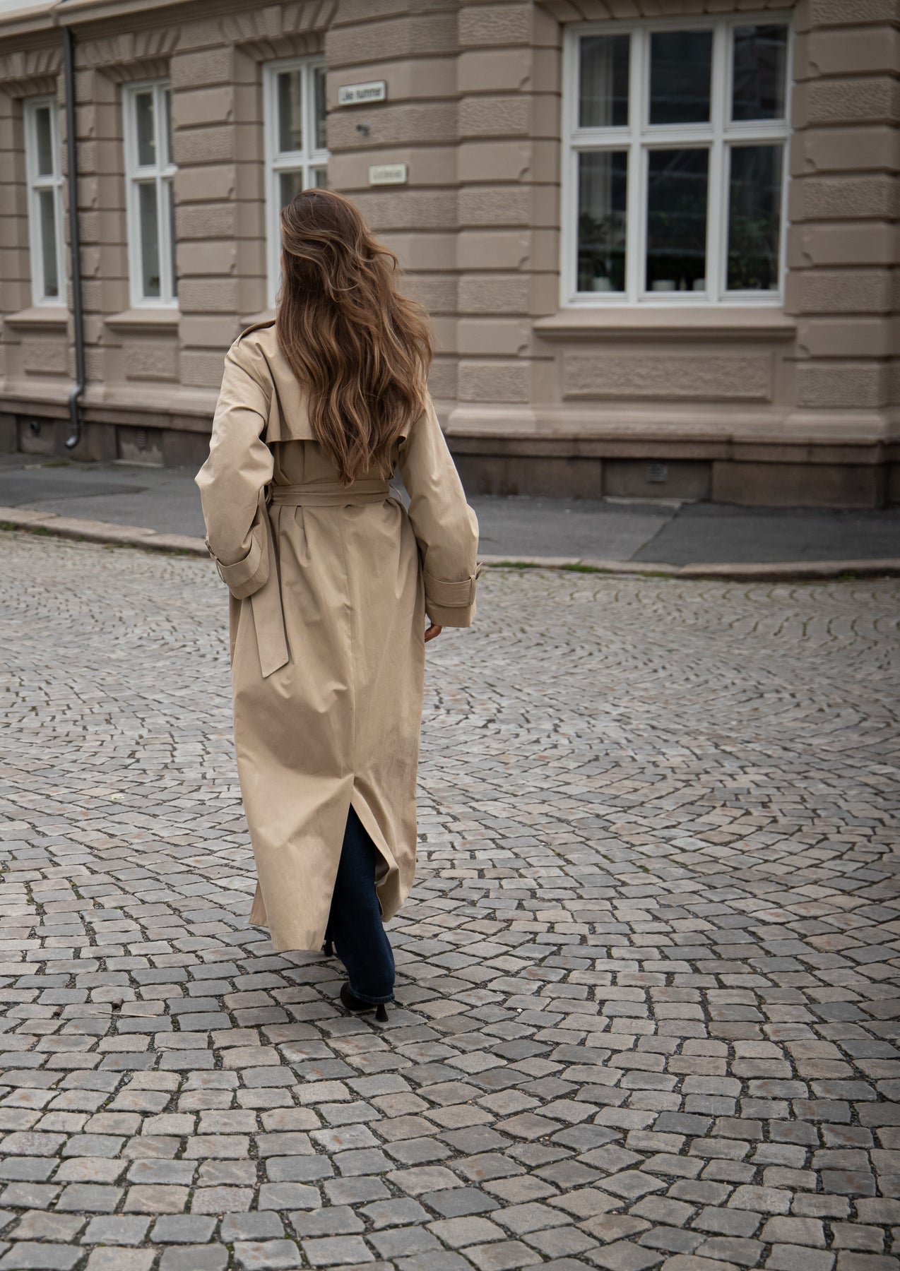 Versatile item: Women's button-down trench coat
