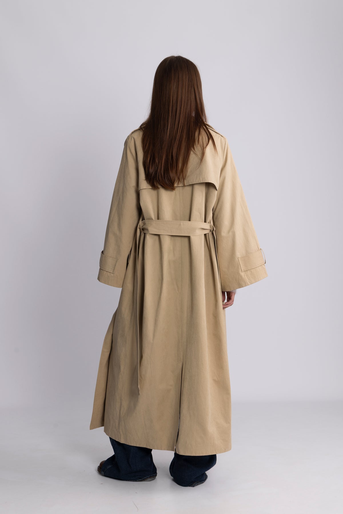 Versatile item: Women's button-down trench coat