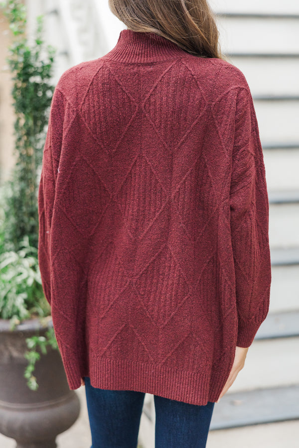 Light-colored turtleneck women's sweater