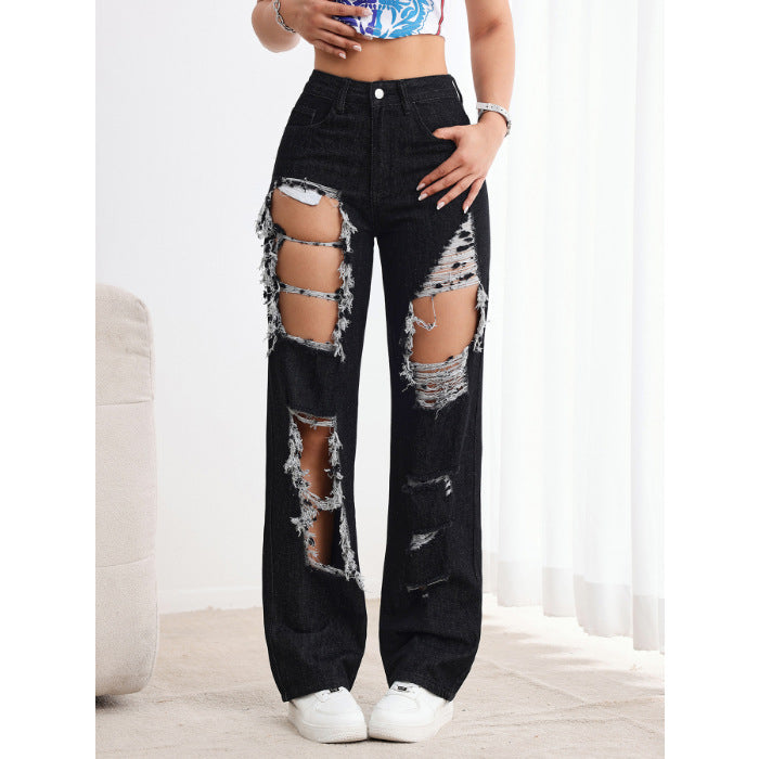 Jeans neri strappati