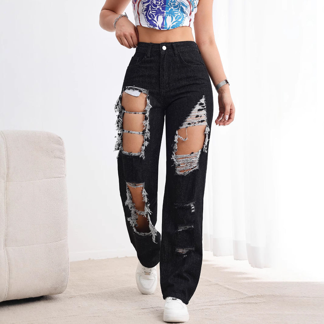 Jeans neri strappati