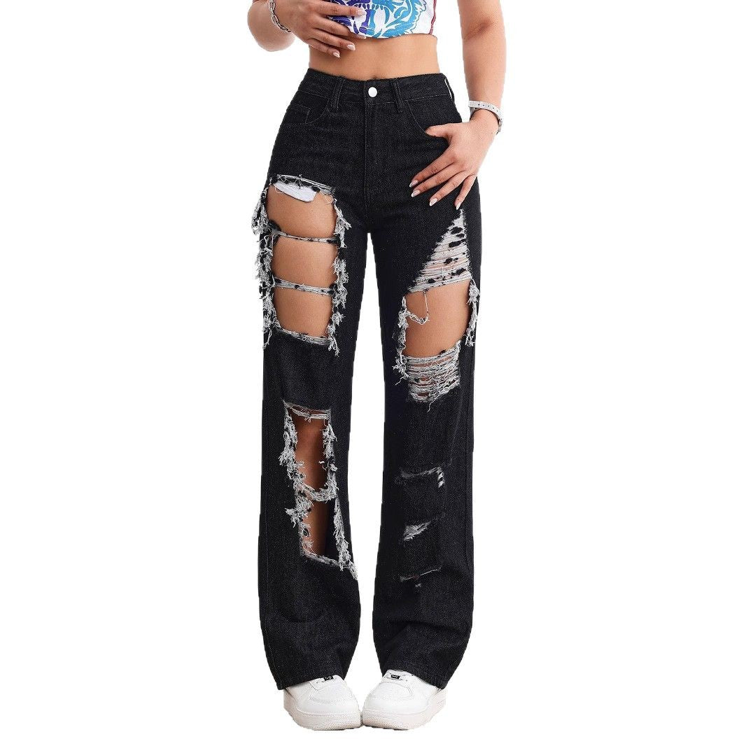 Jeans neri strappati