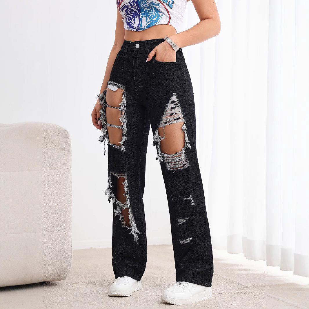 Jeans neri strappati