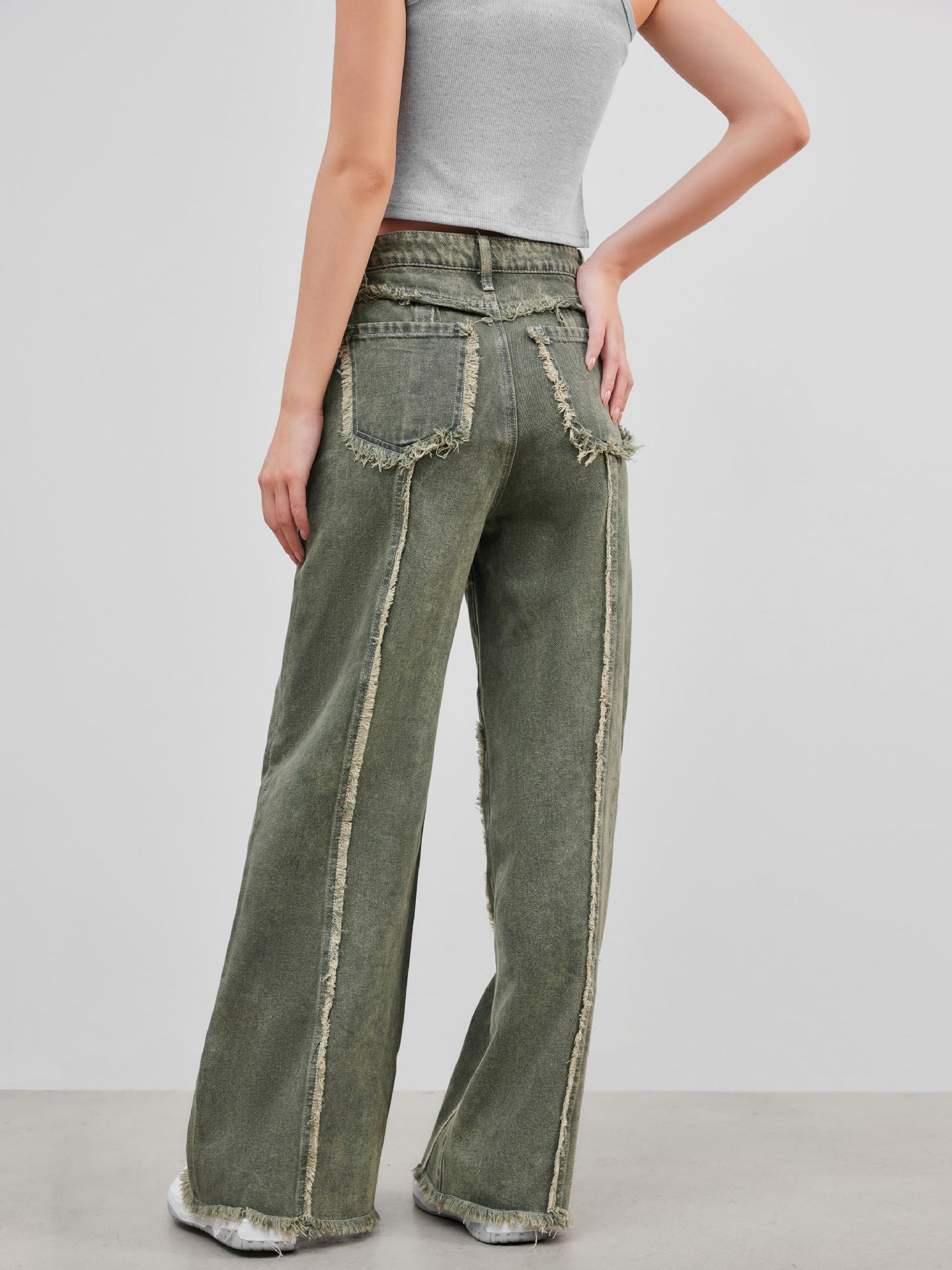 Jeans con pannelli a bordo grezzo
