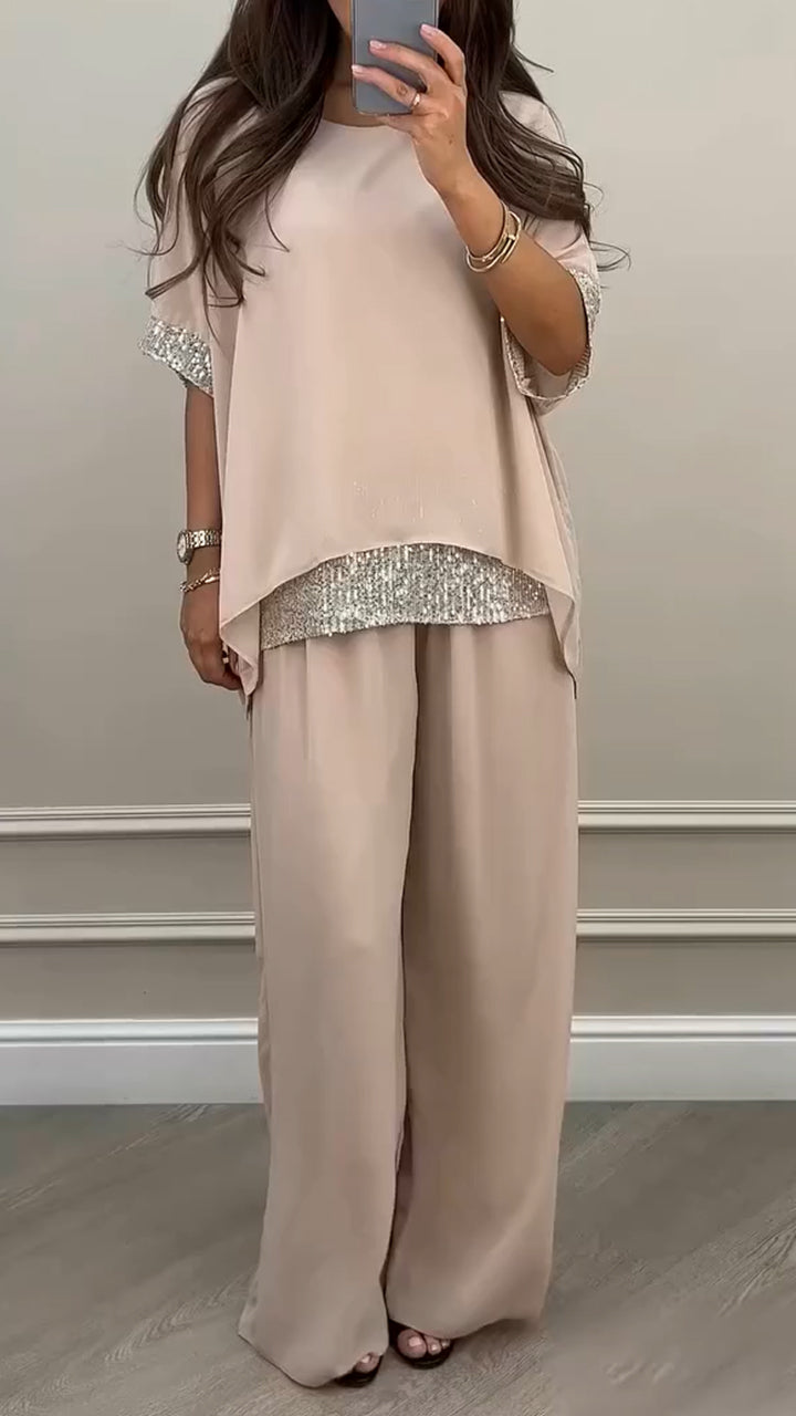 Completo casual da donna con scollo rotondo e cuciture lucide