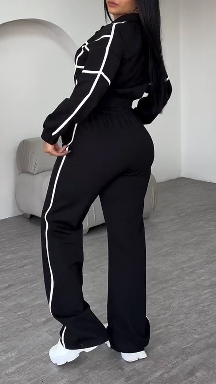Completo casual da donna con colletto, cerniera e pantaloni a righe