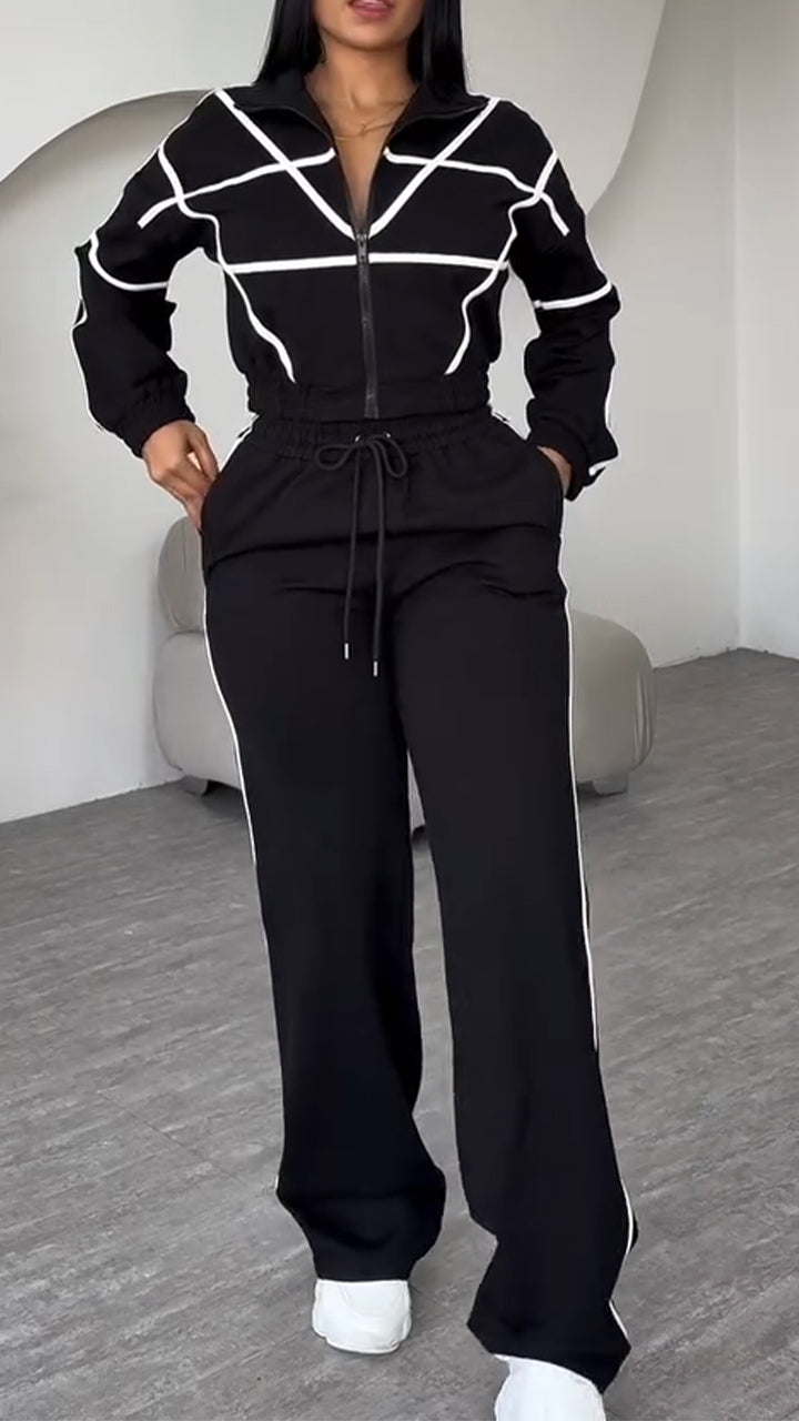 Completo casual da donna con colletto, cerniera e pantaloni a righe
