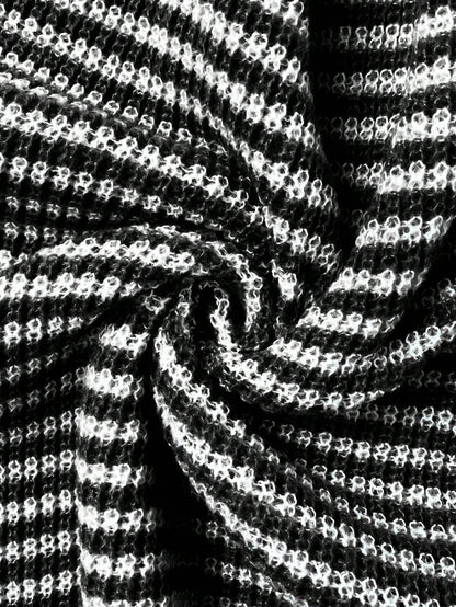 Loose striped off-shoulder knit sweater