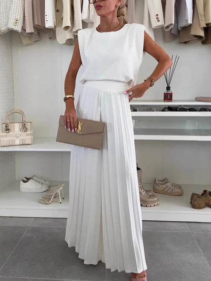 🇬🇧 Two-piece set with sleeveless top and round neckline and pleated wide-leg trousers😍 - MYSTERYBOXS