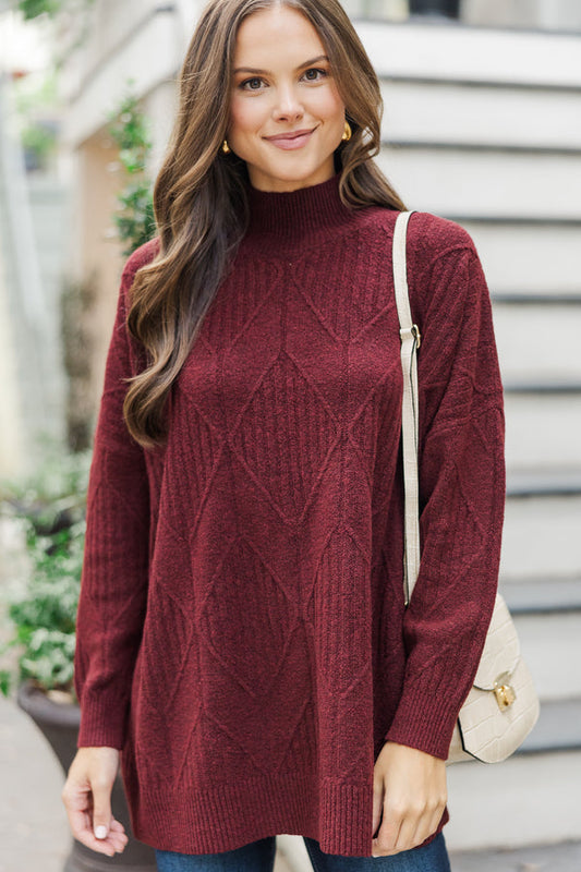 Light-colored turtleneck women's sweater