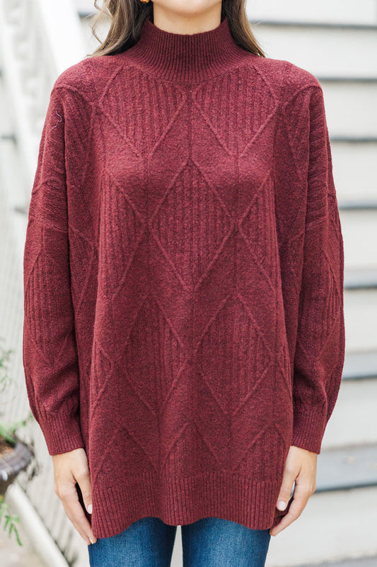Light-colored turtleneck women's sweater