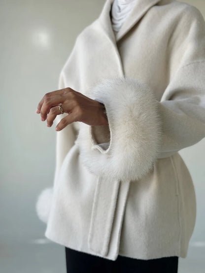 Elegant wool coat for women, with faux fur belt and cuffs